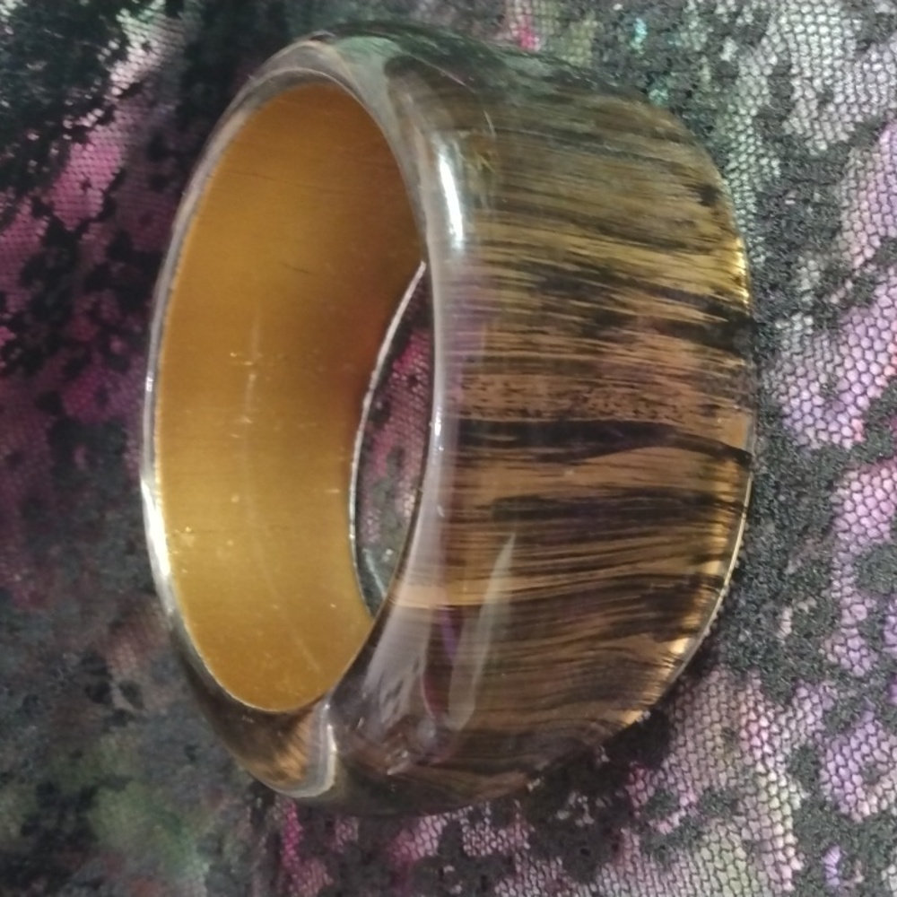Wide black and gold bangle bracelet